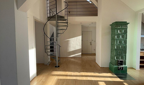 Exclusive, commission-free penthouse apartment with a mezzanine level, conservatory, and a separate guest apartment.