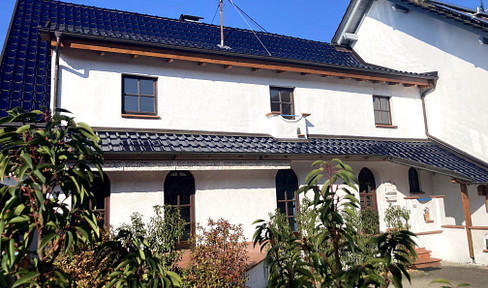 Spacious detached house with a Mediterranean flair, located in a central yet quiet area of Sandweier.