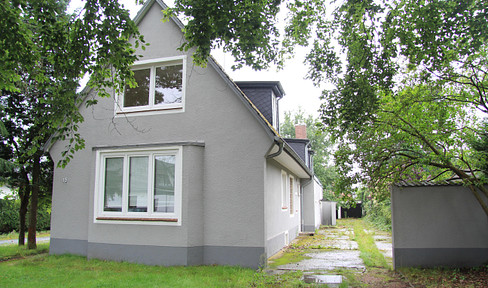Large residential building with its own plot of land.