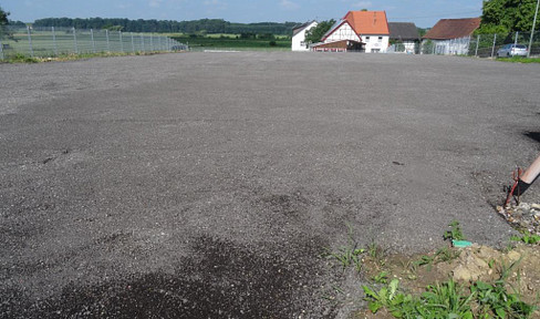 Building plot including a double garage, fenced, located on the outskirts of town.