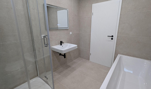 Brand new, never occupied: Modern 3-room apartment with balcony & private garden.