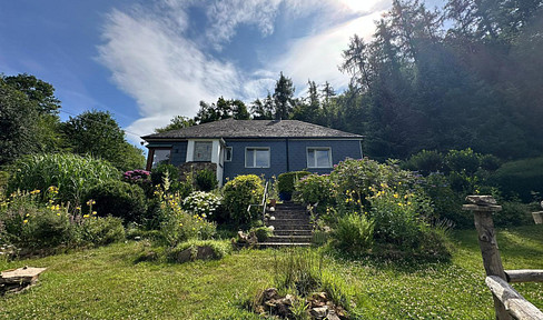 Detached single-family house in a secluded location with panoramic views in the forest.