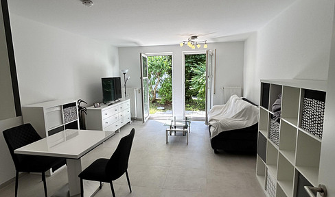 Renovated 1-bedroom apartment with a terrace, new kitchen, elevator, and parking space in Nebringen.