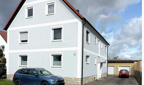 Rented multi-family house with a large garden.
