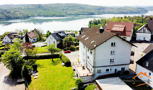 Sorpesee: 88 sqm, 3-room apartment with a balcony, offering panoramic views, featuring a new bathroom and a new kitchen.