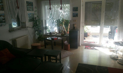 Ground floor apartment in a detached or semi-detached house, with a terrace/garden.