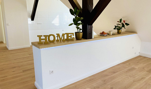 Renovated 4-room attic apartment, including an outdoor parking space.