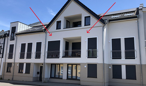 Modern 2-room apartment with a balcony and parking space.