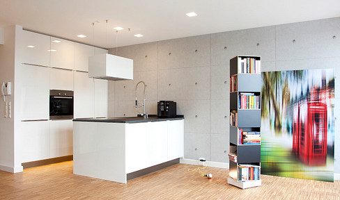 Dreamy maisonette apartment with a south-facing terrace – centrally located, modern, and includes a parking space in an underground garage.
