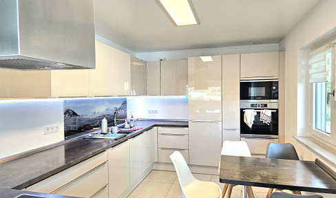Modern 3.5-room ground floor apartment, 155 m², plus 190 m² of outdoor space, with balcony, terrace, and garden.