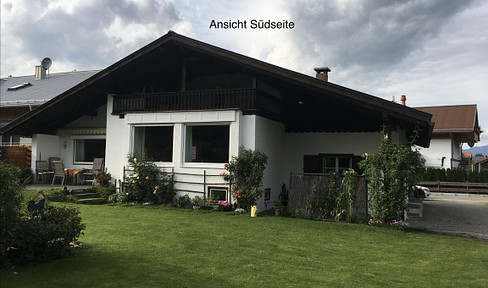 Villasize plot with a 1950s house in a quiet, scenic location in the heart of Oberstdorf, for sale by offer.