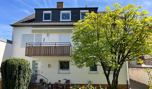 Multi-family house with commercial space, centrally located in Mainz-Kostheim. No commission fees.