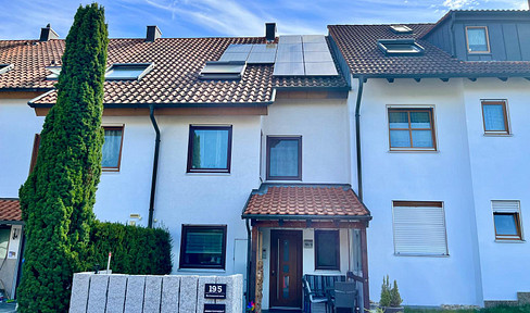 Modernized terraced house with a photovoltaic system.