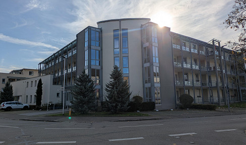 Bright, age-appropriate apartment with a terrace, located in a senior living complex.