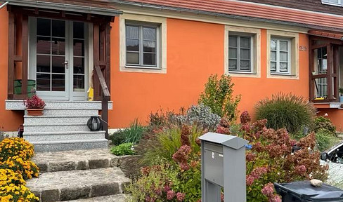 Familientraum mit Garten: Gepflegtes Reihenmittelhaus in ruhiger Wohnlage.