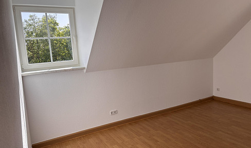 Attic apartment with bright rooms in Lobstädt.