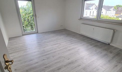 Well-maintained 4-room apartment with balcony and garden.