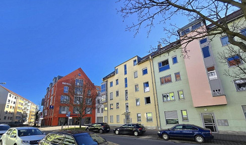 No fees (brokerage or other), available immediately, with a balcony and underground parking, located in the historic old town of Plauen.