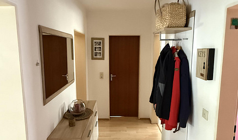 Stylish 4-room apartment with balcony, garage, and cellar, located in a quiet residential area.