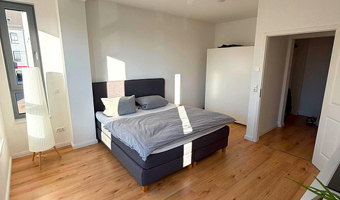 LUXURY near the Elbe River: Exclusive 2-room apartment with balcony and underfloor heating *New construction standard*.