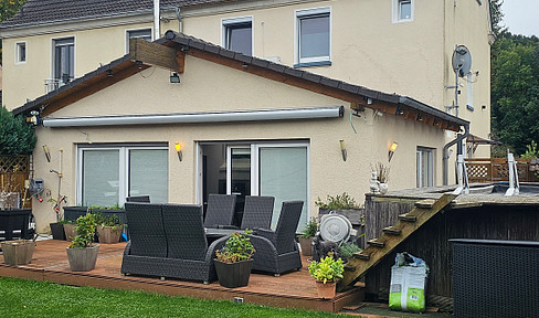 This profitable two-family house finances itself.
