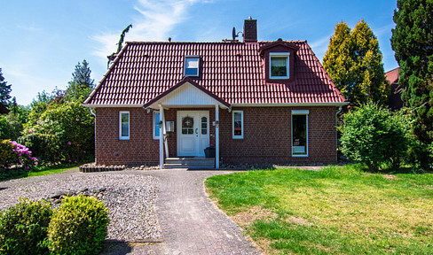 Modern family home with a large garden, located in a quiet area.