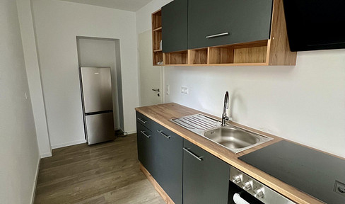 Newly renovated: Modern 2-room apartment | Fitted kitchen | Large balcony.
