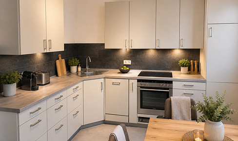 Available for the first time after renovation: 4-room apartment with 2 balconies, a garage, and a parking space.