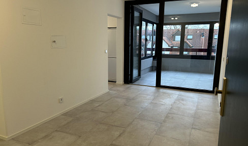 Beautiful apartment with balcony, kitchen, and underground parking space in Kempten.
