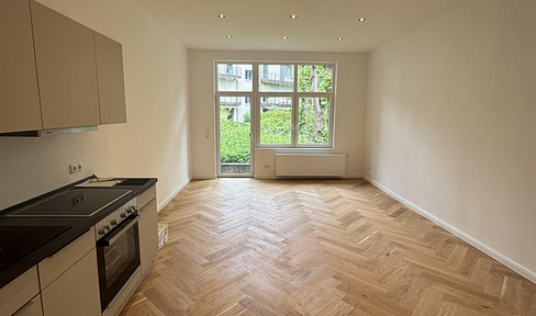 Erstbezug nach Kernsanierung | Stilvolle 1-Zimmer-Wohnung mit Fischgrätboden in Winterhude