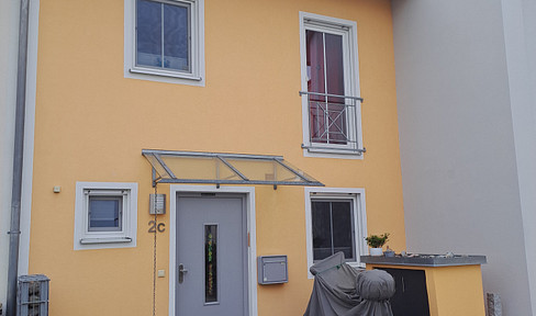 Attractive terraced house with a terrace and garden in Schrobenhausen.