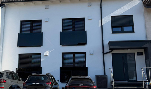 Modern 3-room penthouse apartment (energy efficiency class A+) with a balcony, fitted kitchen, parking space, and a large attic.