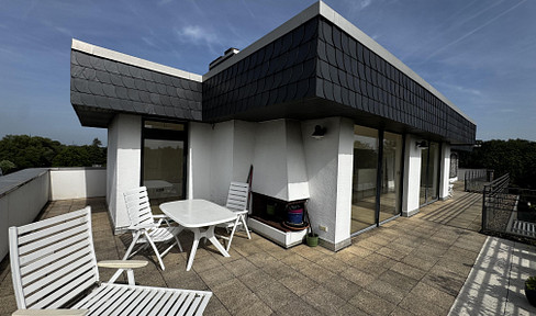 Penthouse in a prime location in Krefeld-Bockum – 110 m² rooftop terrace, fireplace, and unobstructed, panoramic views.