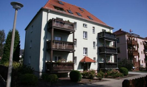 Sonnige 3 Zimmer Wohnung im Erdgeschoss mit Süd-Balkon und Einbauküche