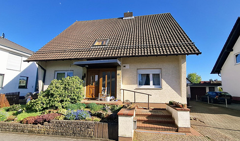 Well-maintained house with a beautiful garden is looking for new residents.