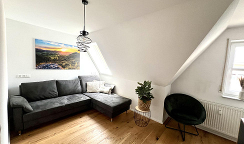 4,5 Zimmer Maisonette-Wohnung mit Balkon und Garage
