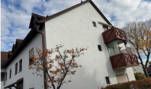 Bright 2-room attic apartment with a south-facing balcony and underground parking in Ebersberg.