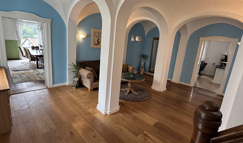Historic residential building with exceptional character and diverse potential uses.