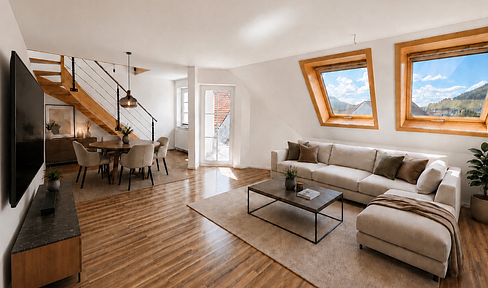 Modernized, bright 3-room attic apartment with fitted kitchen, balcony, and parking space.