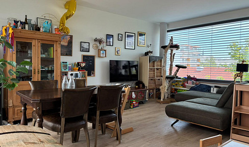 Modern 2-room apartment with fitted kitchen.