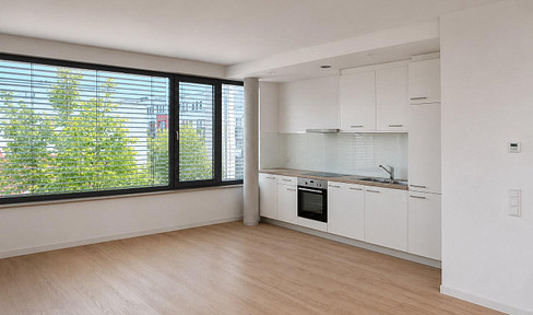 Modern 2-room apartment with fitted kitchen.