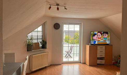 Apartment in the attic of a building, located in Espenau-Mönchehof.