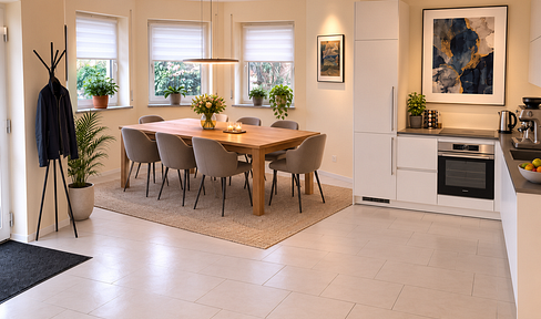 Gemütliche Erdgeschosswohnung mit großem Wohnbereich, offener Küche und Garage