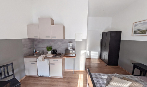 Schickes möbliertes 1-Zimmer-Apartment mit Einbauküche – All-inclusive