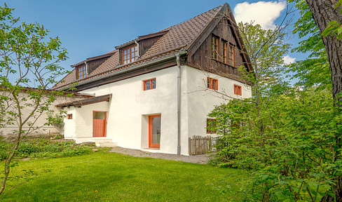Historic watermill on the Lüßbach stream – a unique retreat on a 2,678 square meter plot near Berg.
