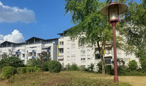 Commission-free | 3-room ground floor apartment with terrace and garage | Energy efficiency class B & district heating | Located in the Dresden area.
