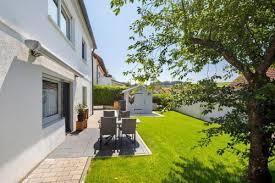 Exclusive terraced house offering the character of a detached home, with luxurious features and finishes.