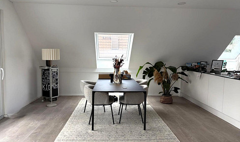 Moderne 4-Zimmer-Dachgeschosswohnung mit Loggia, TG-Stellplatz & Wallbox – Energieklasse A+