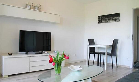 Investment opportunity: 2-room apartment with balcony, fitted kitchen, and underground parking space in Waiblingen.