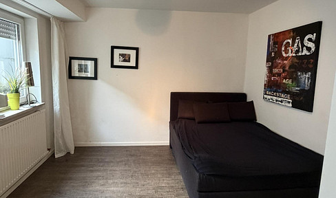 Befristet bis 31.01.2027 – Schöne 1-Zimmer Tiefparterre Wohnung mit separater Küche